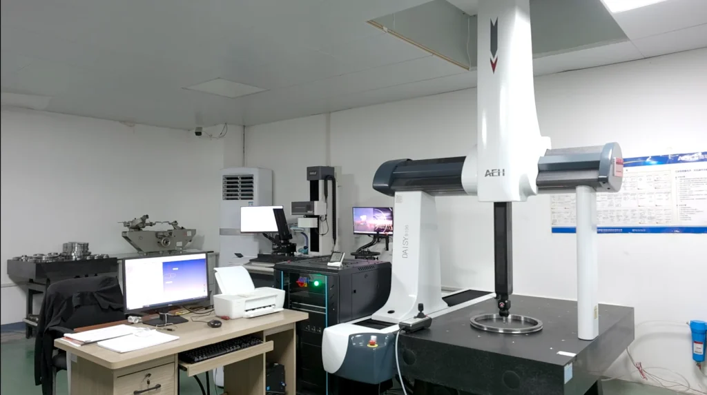 Coordinate measuring machine inspecting a bearing ring in the LYDL inspection room